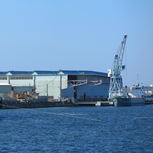 Industrial refrigeration equipment installation with compressors and piping