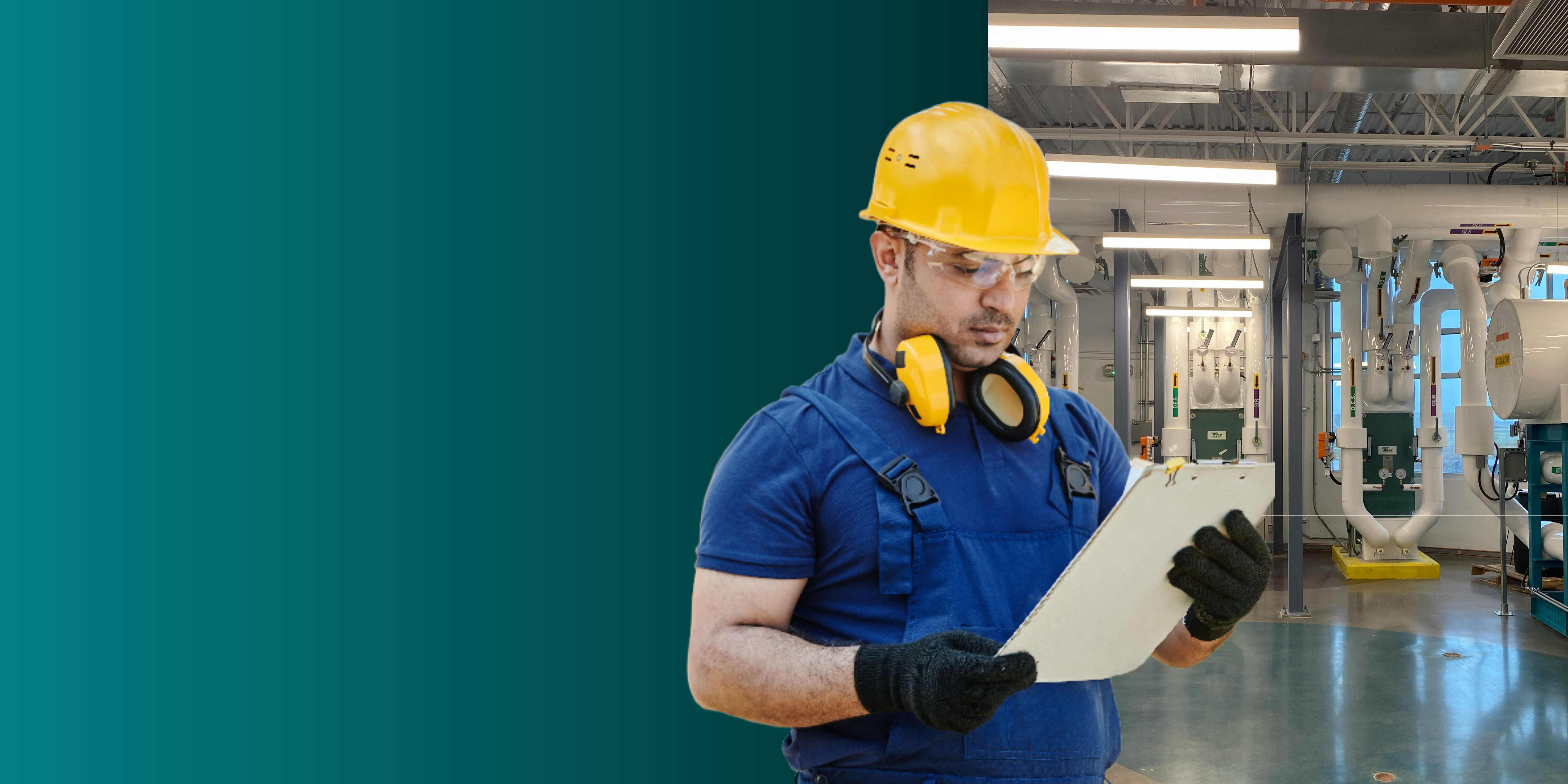 CIMCO Refrigeration technician inspecting an industrial ammonia refrigeration plant